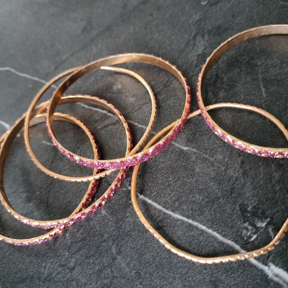 children gold and pink bangles sparkly